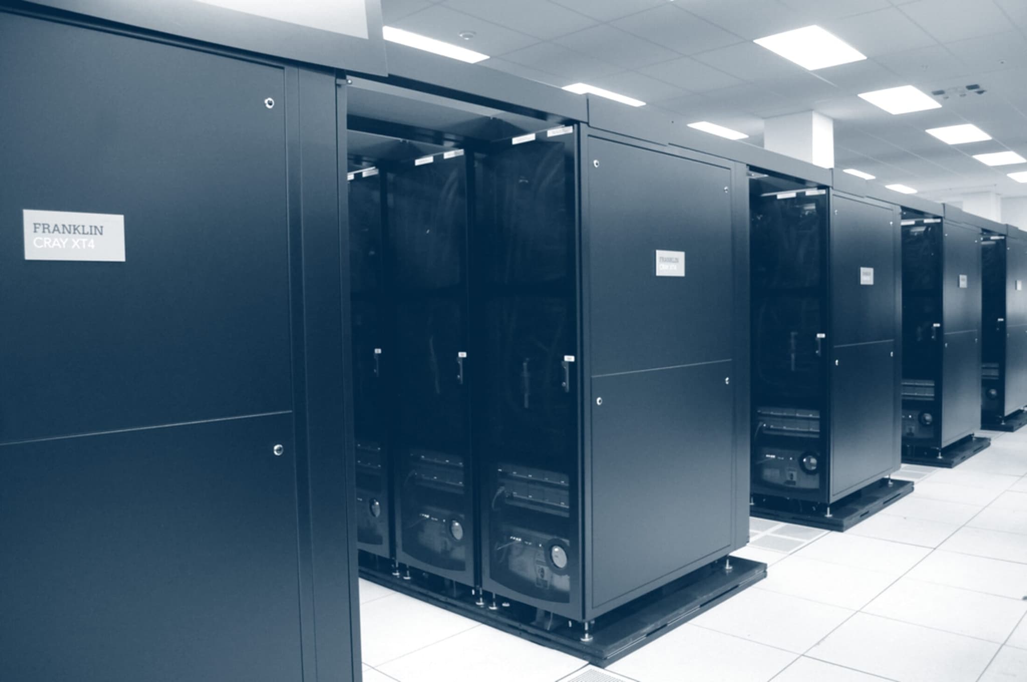 Rows of server cabinets in a data hall